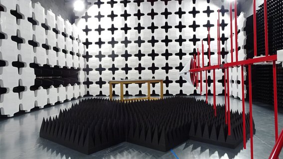 Anechoic chamber with antenna testing equipment 